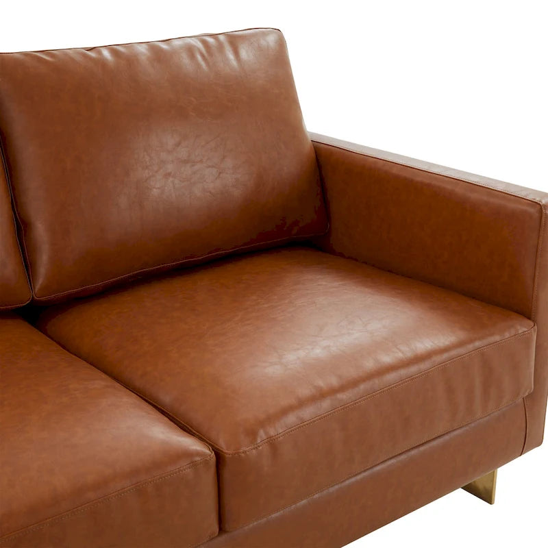 Canapé moderne en cuir tapissé avec cadre doré