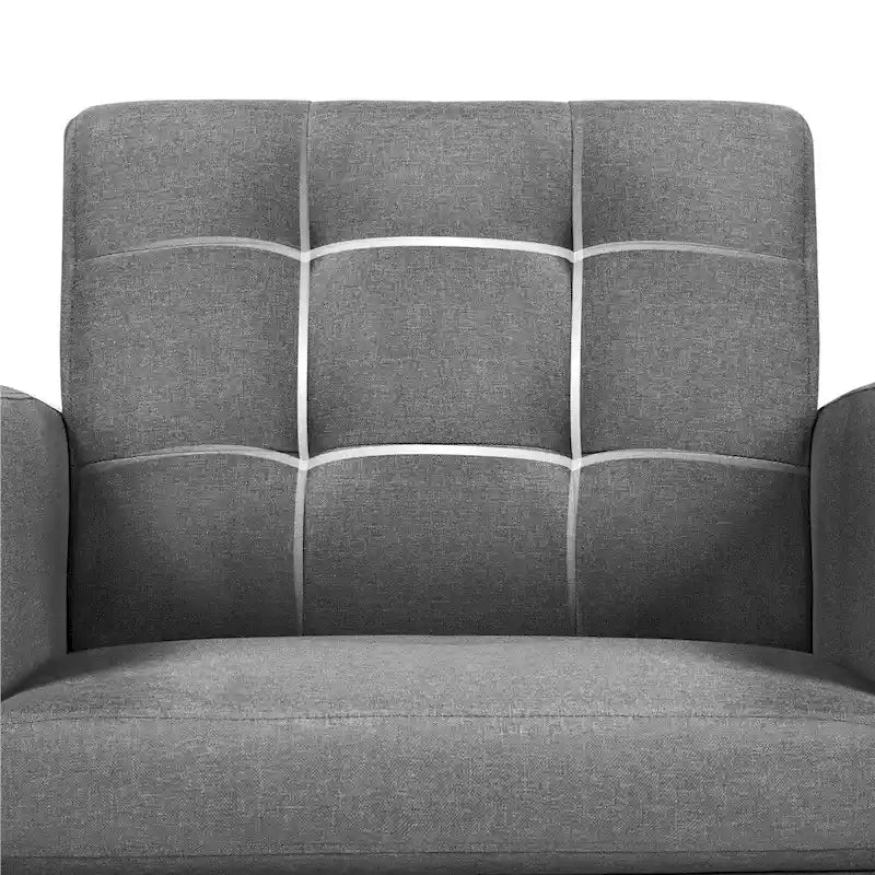 Fauteuil en tissu capitonné avec pieds en bois d'hévéa